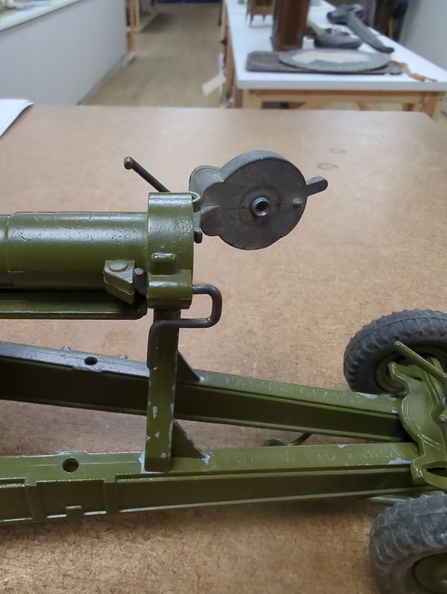 A selection of various Dinky military toys and a boxed Britains 155mm gun